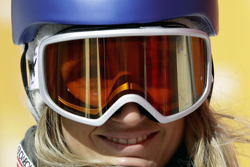 FILE - In this Feb. 12, 2018, file photo, Anna Gasser, of Austria, smiles after her run during the women's slopestyle final at the 2018 Winter Olympics in Pyeongchang, South Korea. Gasser cleaned out her closet in Austria over the weekend and found nine pairs of snow goggles. They’re all being shipped off, including the one she’s pretty certain she wore at the 2018 Pyeongchang Games. Destination: Health-care workers. (AP Photo/Lee Jin-man, File)