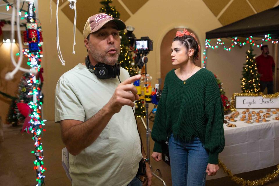 Director Ross Marks speaks to the cast on Wednesday, Oct. 25, 2023, on the set of Santa Assist.