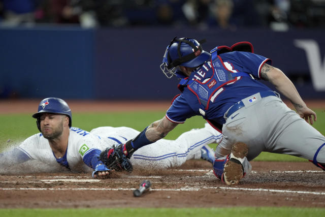 Heim launches grand slam, Carter hits 1st career home run as the Rangers  beat the Blue Jays 10-4