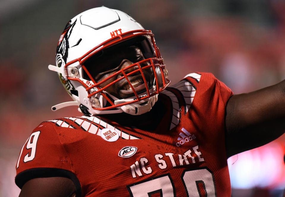 Oct 30, 2021; Raleigh, North Carolina, USA;  North Carolina State Wolfpack tackle Ikem Ekwonu (79) warms up prior to a game against the Louisville Cardinals at Carter-Finley Stadium. Mandatory Credit: Rob Kinnan-USA TODAY Sports