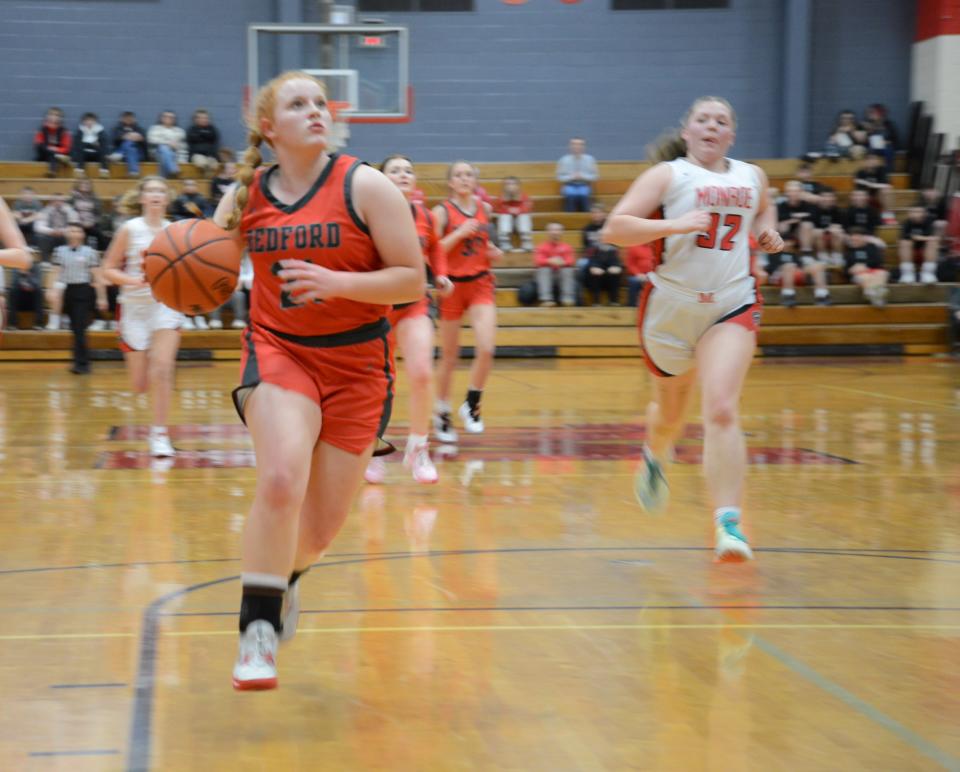 Bedford's Aubrey Hensley cruises in for a layup during a 50-7 win over Monroe Friday night.