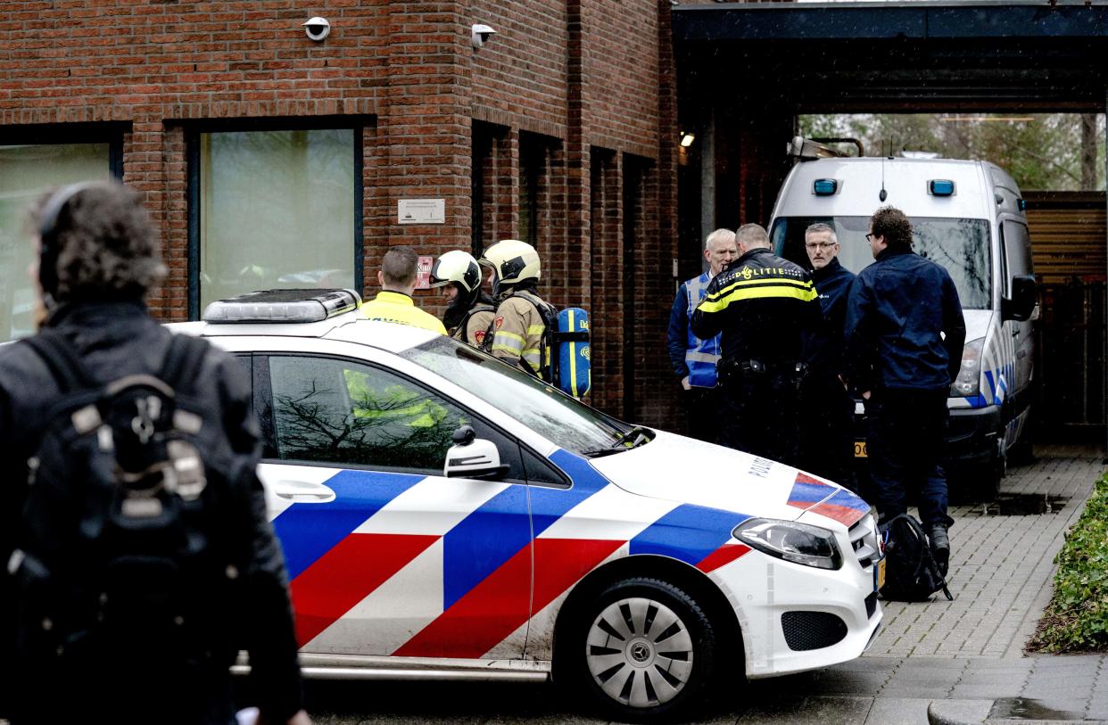 Dutch police and emergency personnel gather during the investigation of a suspicious letter which was delivered to Unisys Payment Services in Leusden on 13 February, 2020. Dutch police have arrested an alleged gang leader likened to ‘El Chapo’.    (ANP/AFP via Getty Images)