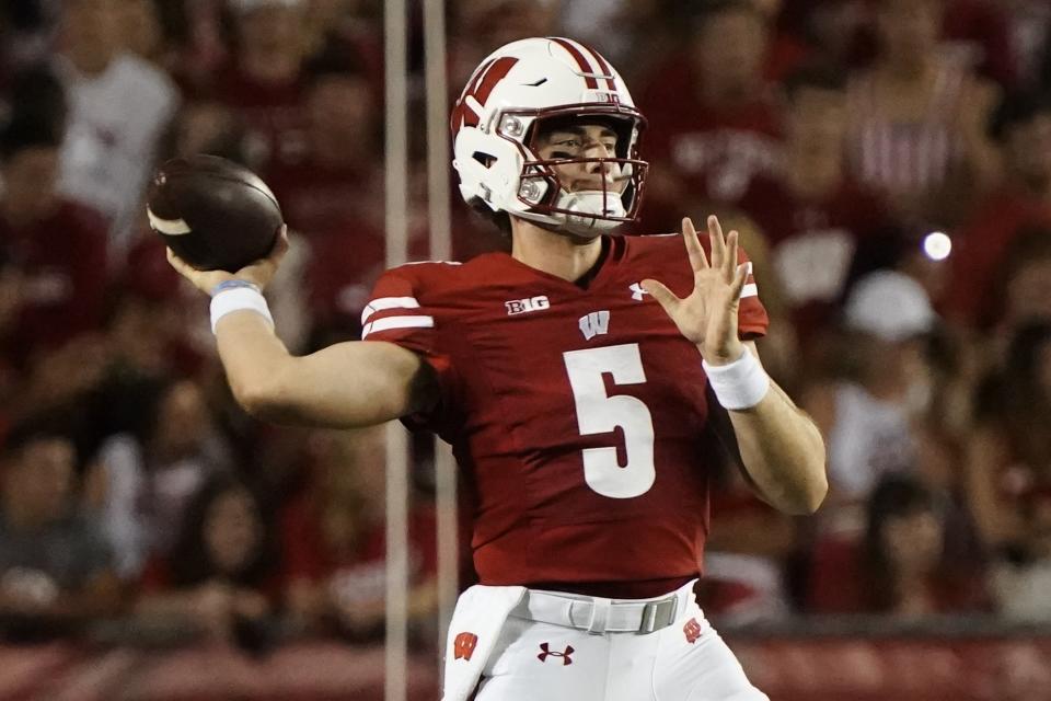 Wisconsin's Graham Mertz (5) throws during the second half of an NCAA college football game against Illinois State Saturday, Sept. 3, 2022, in Madison, Wis. (AP Photo/Morry Gash)