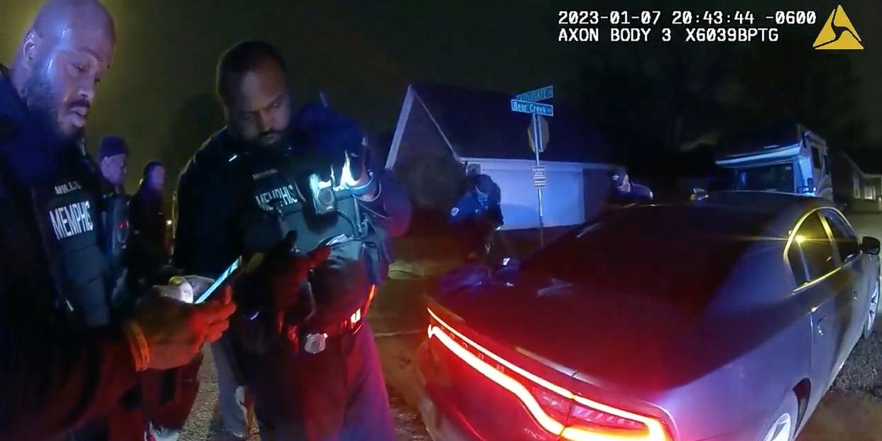 The image from video released on Jan. 27, 2023, by the City of Memphis, shows police officers talking after a brutal attack on Tyre Nichols by five Memphis police officers on Jan. 7, 2023, in Memphis, Tenn. Nichols died on Jan. 10. The five officers have since been fired and charged with second-degree murder and other offenses. (City of Memphis via AP)