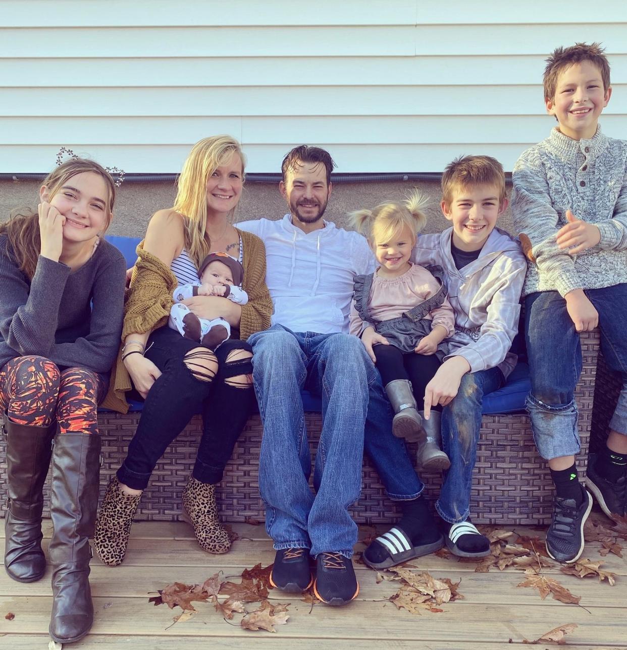 Michelle Mammarella with her husband, Nate, and their children, who range in age from 1 to 13.