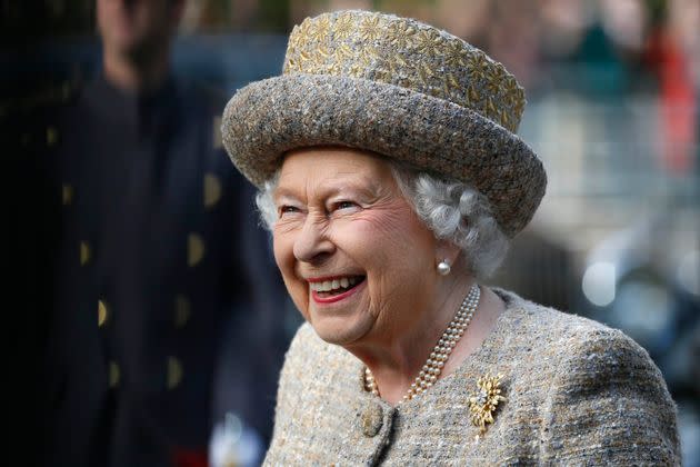 Queen Elizabeth II smiles as she arrives before the Opening of the Flanders' Fields Memorial Garden at Wellington Barracks on Nov. 6, 2014 in London, England.