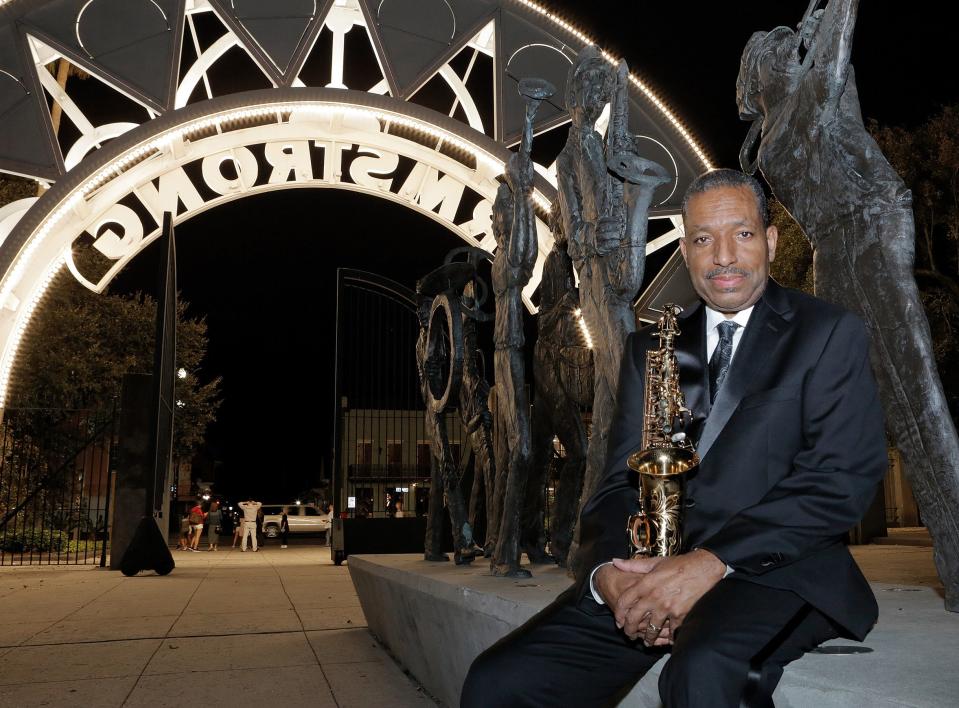 New Orleans jazz legend Donald Harrison poses at the entrance to Armstrong Park where Congo Square is located. Harrison is the Big Chief of the Congo Nation Afro-New Orleans Cultural Group, which keeps alive the traditions of Congo Square.