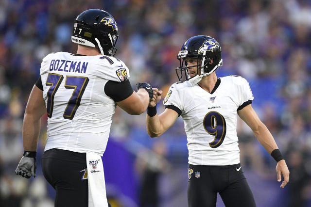 Baltimore Ravens' Justin Tucker (9) attempts a field goal as Sam