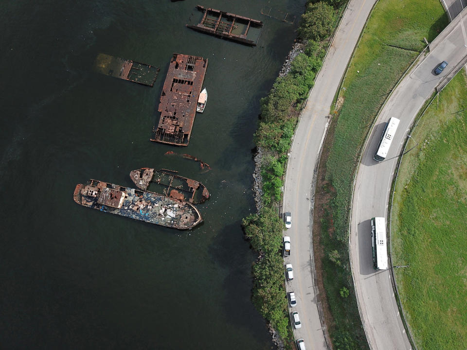 Remains of abandoned ships are seen on the shores of the Guanabara Bay in Niteroi, Brazil, on Dec. 28, 2022.<span class="copyright">Pilar Olivares—Reuters</span>