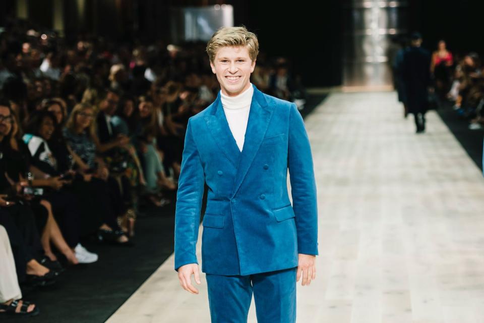 <p>Naomi Rahim/WireImage</p> Robert Irwin, son of the late Steve Irwin, makes his runway debut at the Melbourne Fashion Festival on March 6