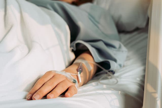 <p>Getty</p> Woman Lying Sick in Hospital.