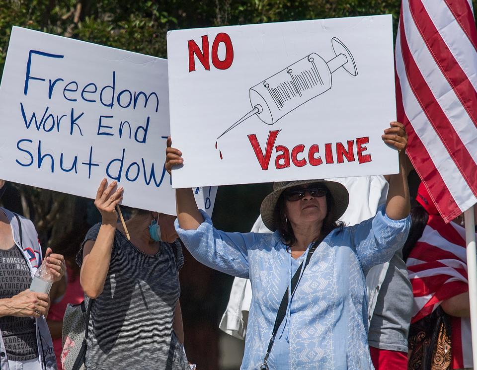 Supporters of the US president hold a rally to call for the reopening of the California economy after the lockdown closure, implemented to stop the spread of the novel coronavirus (which causes Covid-19), in Woodland Hills, California, on May 16, 2020. (Mark Ralston/AFP via Getty Images)