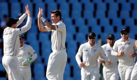 Cricket - New Zealand v South Africa - second cricket test match - Centurion Park, Centurion, South Africa - 29/8/2016. New Zealand's Tim Southee celebrates bowling out South Africa's JP Duminy. REUTERS/Siphiwe Sibeko