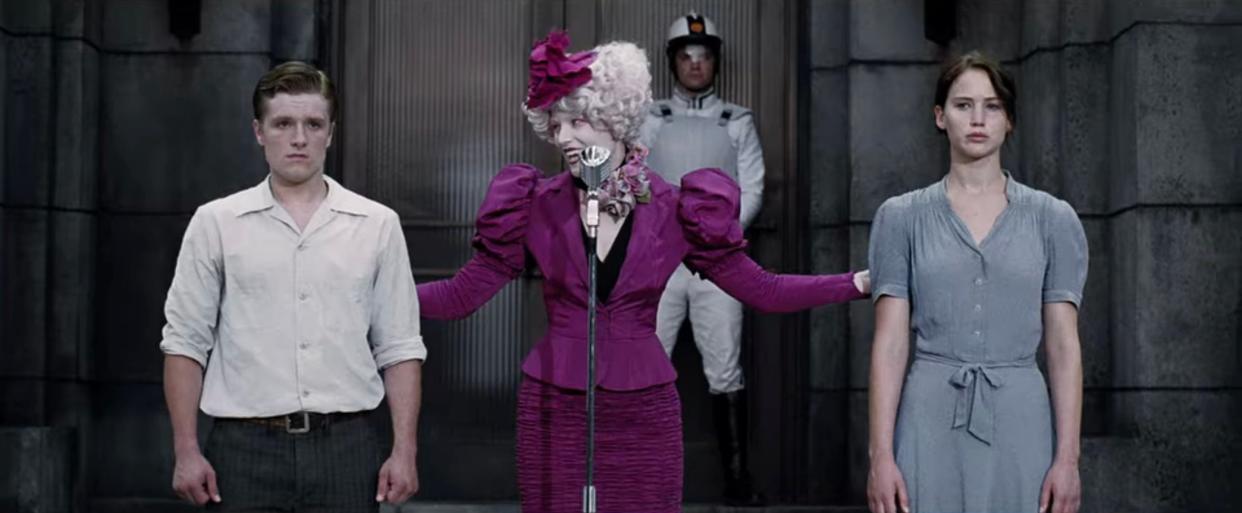 Josh Hutcherson as Peeta, Elizabeth Banks as Effie, and Jennifer Lawrence as Katniss in "The Hunger Games."