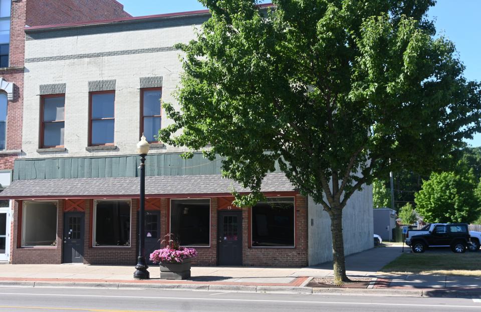 The building at 71-73 West Chicago St. was sold by the city for the development of a bar/restaurant and apartments.