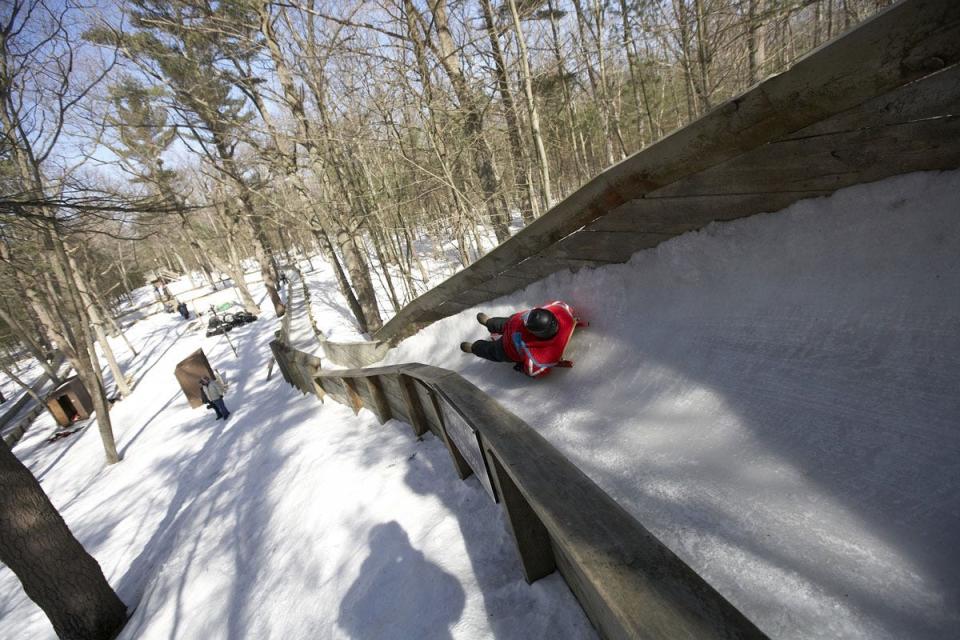 The 850-foot luge run at Muskegon Winter Sports Complex relies on naturally frozen ice and is seen in a prior winter.