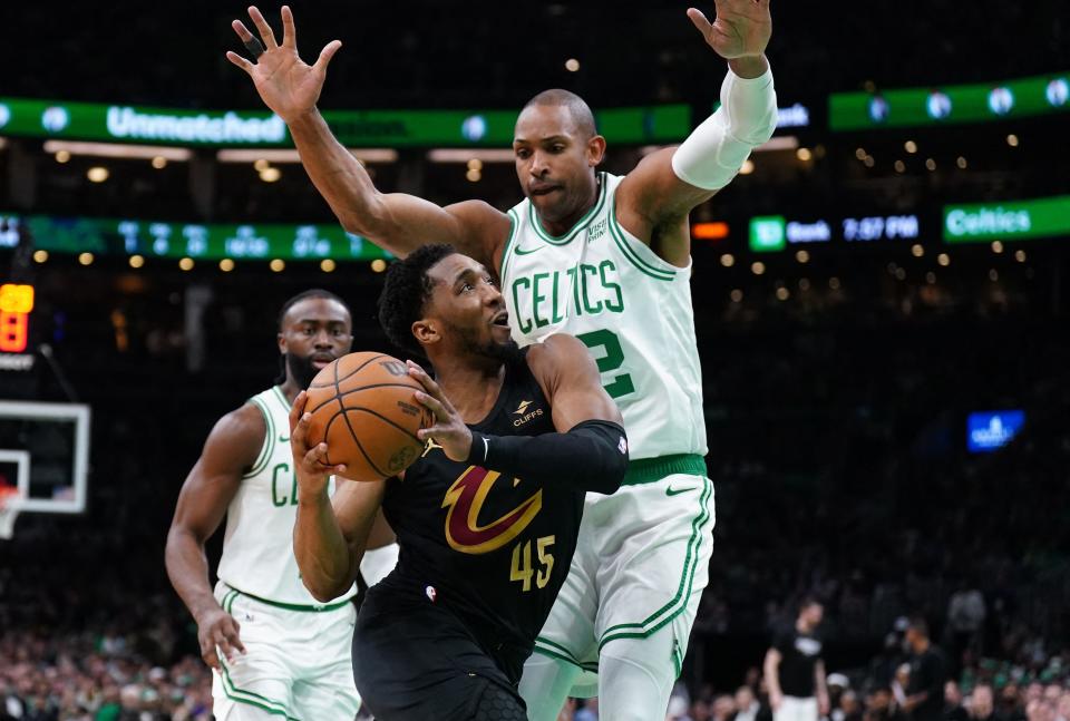 Cavaliers guard Donovan Mitchell drives the ball against Celtics center Al Horford in the second quarter during Game 2 of the Eastern Conference semifinals, May 9, 2024, in Boston.