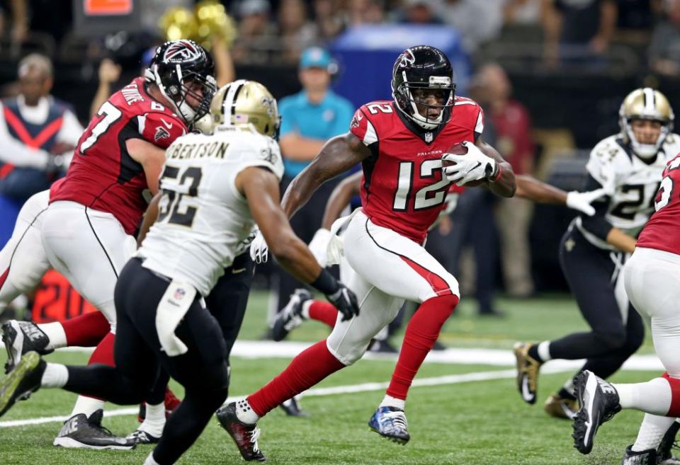 Sep 26, 2016; New Orleans, LA, USA; Atlanta Falcons wide receiver Mohamed Sanu (12) carries the ball against the New Orleans Saints in the second quarter at the Mercedes-Benz Superdome. Mandatory Credit: Chuck Cook-USA TODAY Sports