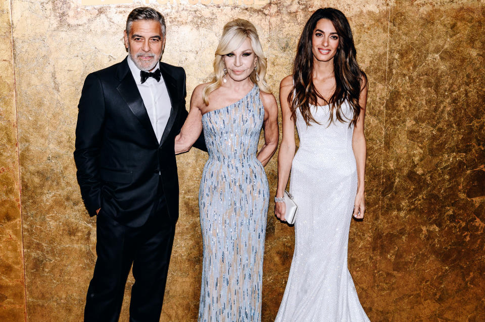 George Clooney, Donatella Versace and Amal Clooney at the Clooney Foundation For Justice's "The Albies" on September 28, 2023 in New York City.