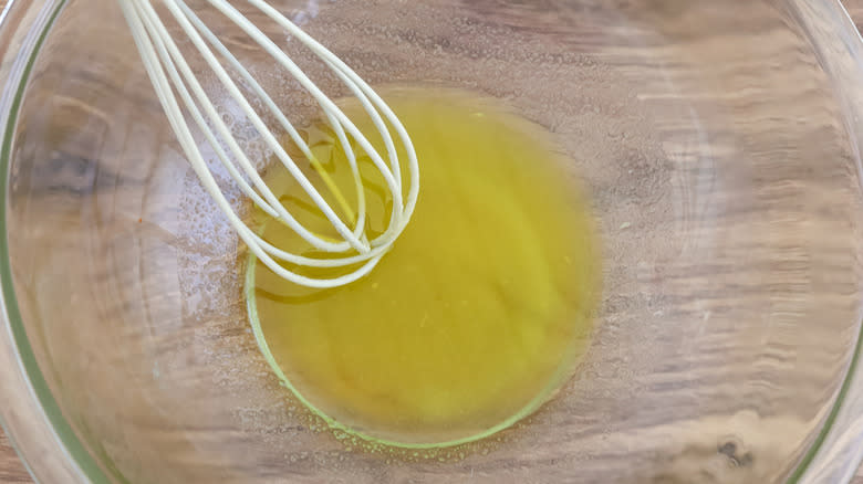oil and whisk in bowl