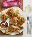 Grilling the chicken adds a lovely charred flavour before the pieces soak up the tangy tarragon, chervil, chive and tomato dressing.<br><br><a rel="nofollow" href="https://au.lifestyle.yahoo.com/better-homes-gardens/recipes/r/28546338/karen-martini-barbecue-chicken-with-tomato-dressing/" data-ylk="slk:RECIPE: Barbecue chicken with tomato dressing;elm:context_link;itc:0;sec:content-canvas" class="link ">RECIPE: Barbecue chicken with tomato dressing</a>