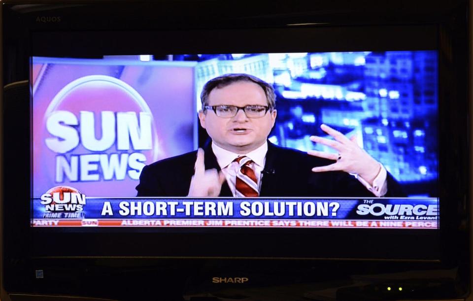 ‘The Source with Ezra Levant’ program is shown on a television in February 2015. The Sun News Network shut down after negotiations to sell the troubled television network failed. THE CANADIAN PRESS/Doug Ives