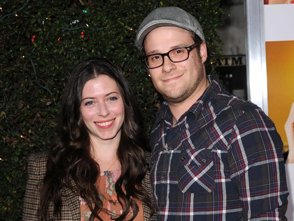 Actor Seth Rogen (R) and Lauren Miller arrive to the "How Do You Know" Los Angeles Premiere at Regency Village Theatre on December 13, 2010 in Westwood, California.
