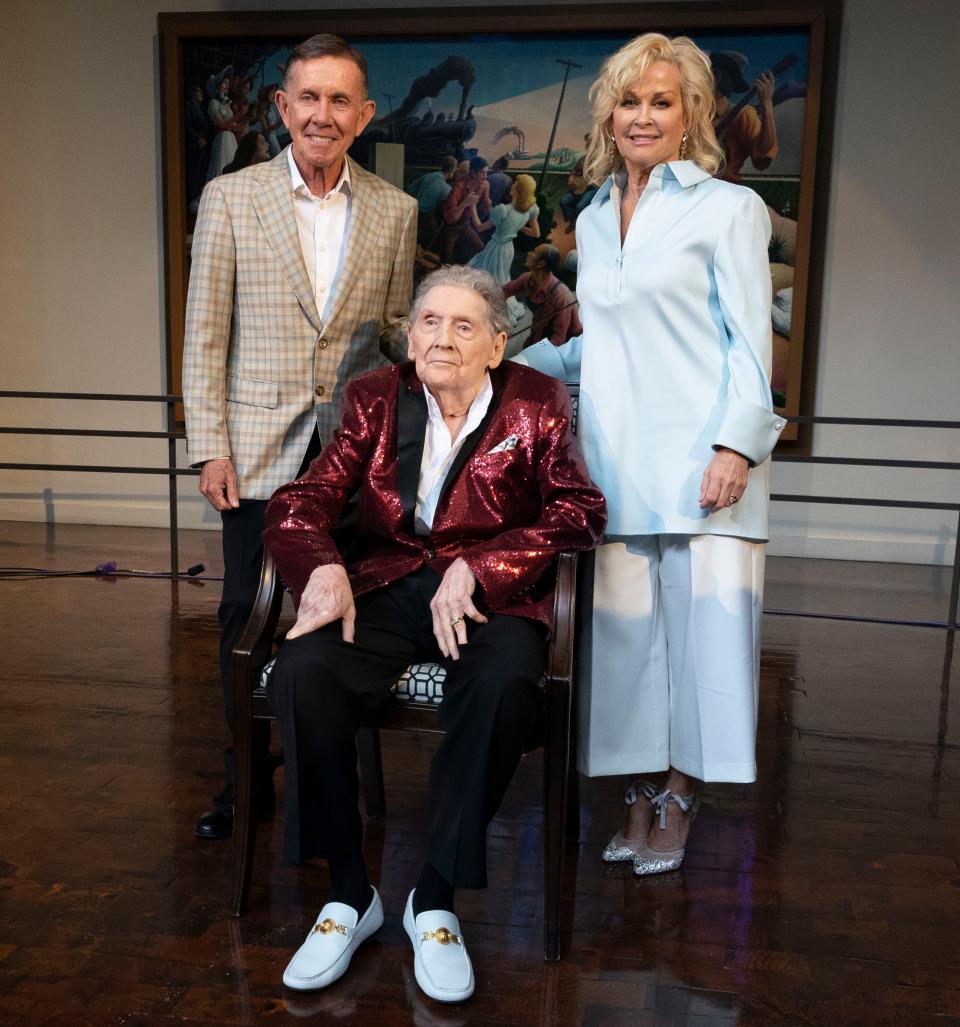 Joe Galante, Jerry Lee Lewis and Lorrie Morgan pose for a portrait after Galante, Lewis and Morgan's late husband Keith Whitley were announced as 2022 Country Music Hall of Fame inductees during a press conference at the Country Music Hall of Fame Tuesday, May 17, 2022, in Nashville, Tenn.