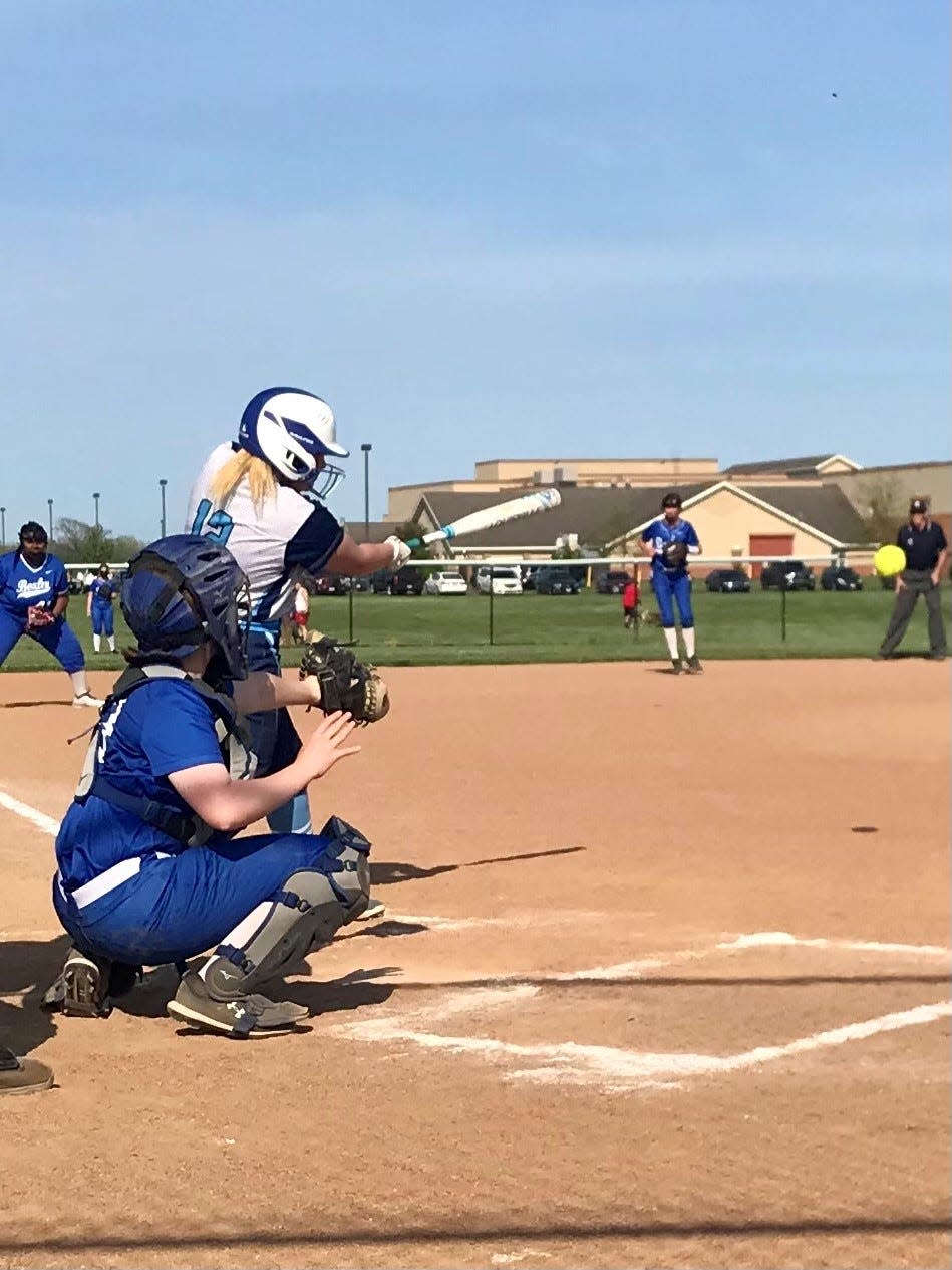 River Valley's Emily Radcliff hits the ball during last week's 19-0 Division II sectional softball title win over Bexley at RV. The Vikings made it to the district level along with five other area teams this week.