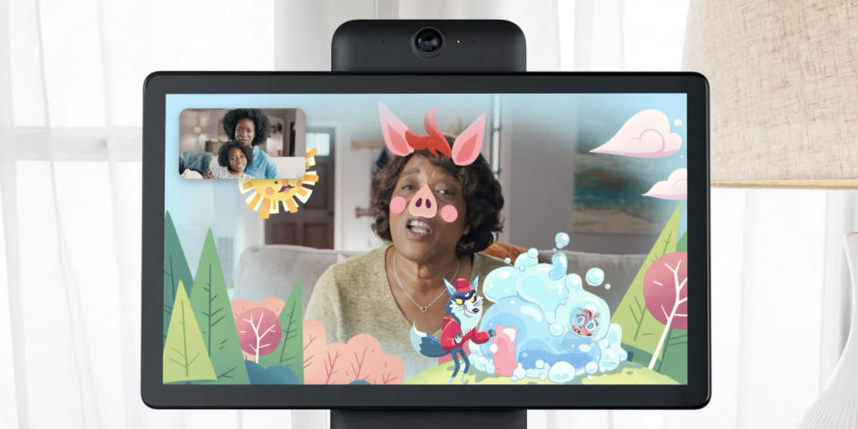 A woman conducts a video chat with cartoon filters on a Portal smart screen.