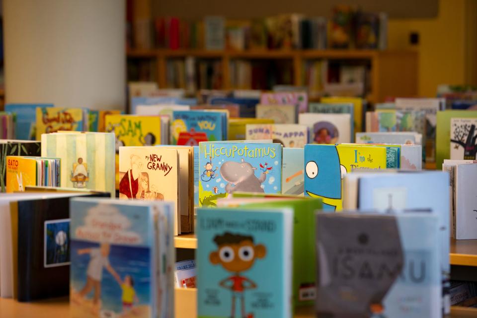 Library books fill the picture books section at the Eugene Public Library on Wednesday.