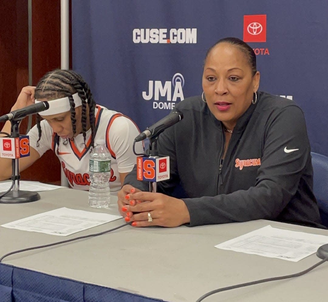 Rochester's Dyaisha Fair, left, and Syracuse coach Felisha Legette-Jack after the Orange's 73-72 win over Louisville on Sunday, Feb. 11, 2024 at the JMA Wireless Dome. Fair scored 29 points and is currently sixth all-time on the NCAA Division I scoring list.