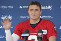 Seattle Seahawks quarterback Drew Lock talks to reporters after NFL football practice Monday, Aug. 1, 2022, in Renton, Wash. (AP Photo/Ted S. Warren)