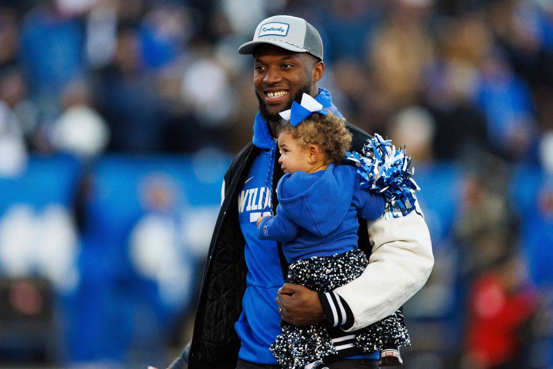 Former Kentucky and current Jacksonville Jaguars linebacker Josh Allen is recognized on the field with his daughter Vanessa during UK’s game against Georgia this past season.