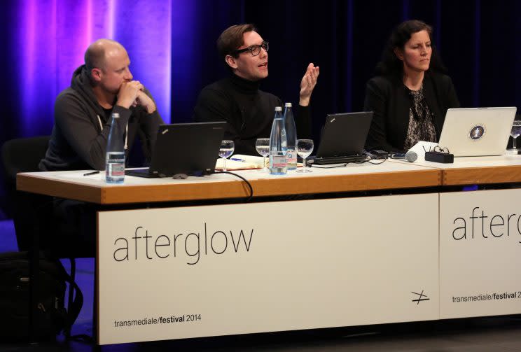 GettyImages-465973589: (L to R) Trevor Paglen, artist, geographer and author, Jacob Appelbaum, computer security researcher, hacker and photographer, and Laura Poitras, documentary filmmaker, attend the Transmediale festival for art and digital culture on January 30, 2014 in Berlin, Germany. (Photo: Adam Berry/Getty Images)