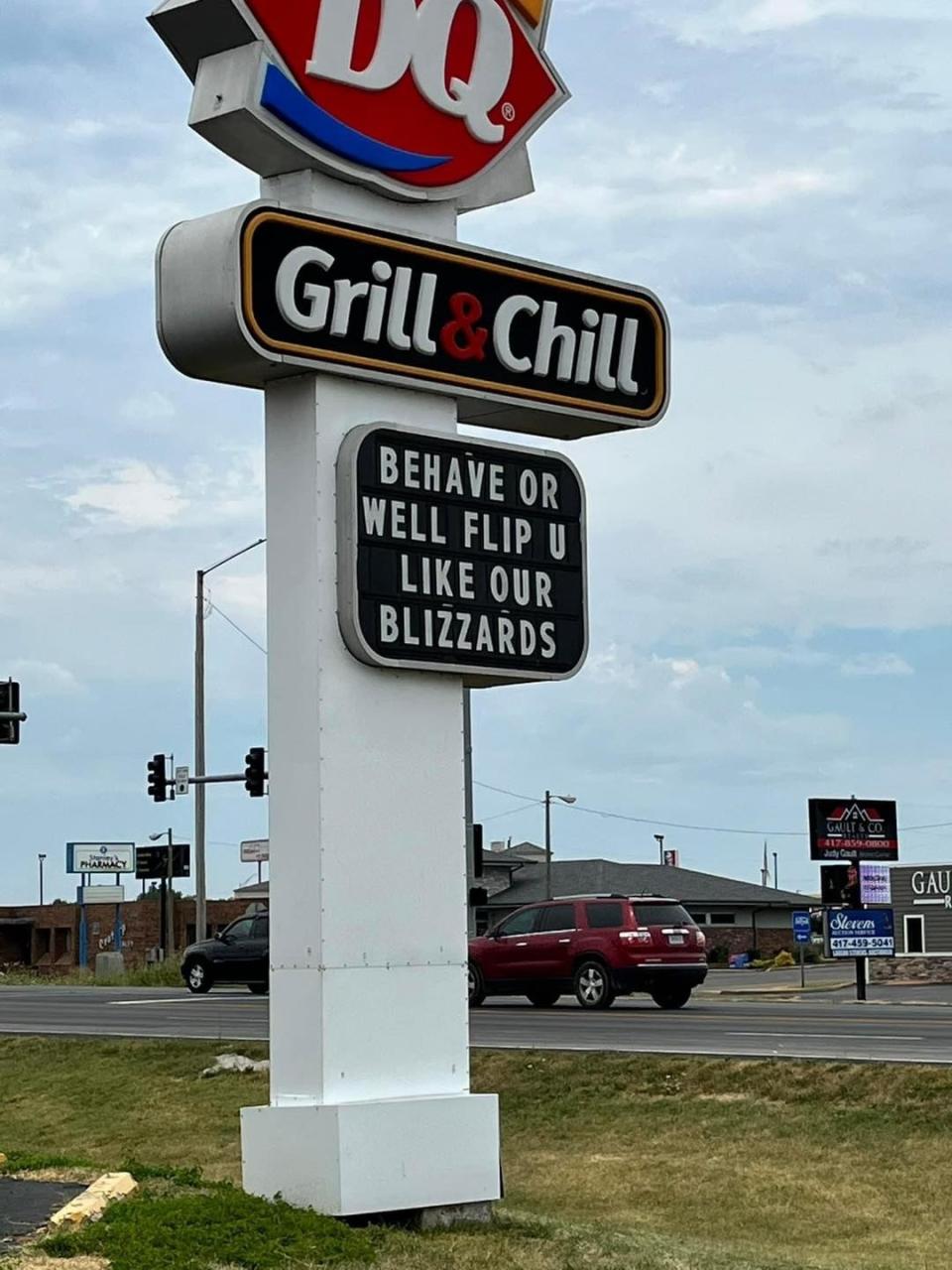 Dairy Queen's sign says "Behave or we'll flip you like our blizzards"