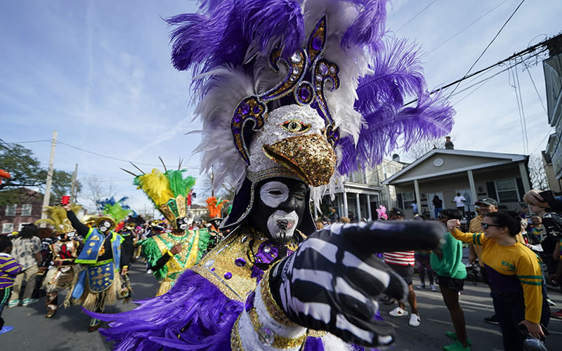 A member of the traditional Mardi Gras group The Tramps marches during the Krewe of Zulu Parade on Mardi Gras