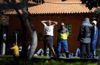 Detained fans of Boca Juniors football club are pictured at the headquarters of the Special Operations Forces of the Paraguayan Police in Asuncion, Paraguay, April 29, 2016. REUTERS/Jorge Adorno