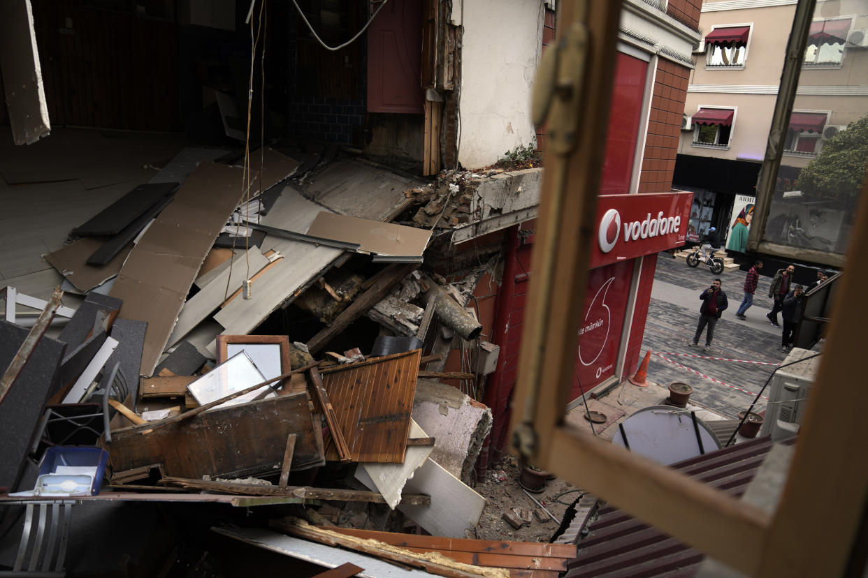 Damaged shops in Duzce, Turkey, Wednesday, Nov. 23, 2022, after a magnitude 5.9 earthquake hit a town in northwest Turkey early Wednesday, causing damage to some buildings and widespread panic. At least 68 people were injured, mostly while trying to flee homes. The earthquake was centered in the town of Golkaya, in Duzce province, some 200 kilometers (125 miles) east of Istanbul, the Disaster and Emergency Management Presidency said.(AP Photo/Khalil Hamra)