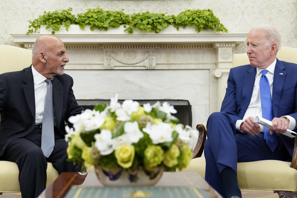 President Joe Biden, right, meets with Afghan President Ashraf Ghani, left, in the Oval Office of the White House in Washington, Friday, June 25, 2021. (AP Photo/Susan Walsh)