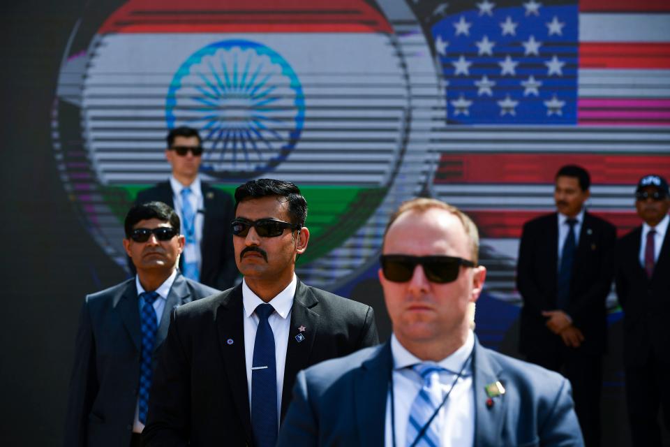 Members of the US Secret Service and Indian Special Protection Group (SPG) stand guard during 'Namaste Trump' rally at Sardar Patel Stadium in Motera, on the outskirts of Ahmedabad, on February 24, 2020. (Photo by Mandel NGAN / AFP) (Photo by MANDEL NGAN/AFP via Getty Images)