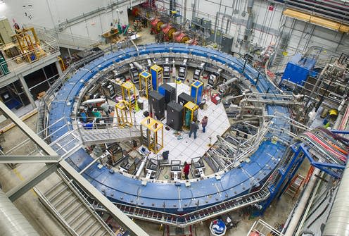 <span class="caption">The storage-ring magnet for the Muon G-2 experiment at Fermilab.</span> <span class="attribution"><a class="link " href="https://vms.fnal.gov/asset/detail?recid=1950114" rel="nofollow noopener" target="_blank" data-ylk="slk:Reidar Hahn/wikipedia;elm:context_link;itc:0;sec:content-canvas">Reidar Hahn/wikipedia</a>, <a class="link " href="http://creativecommons.org/licenses/by-sa/4.0/" rel="nofollow noopener" target="_blank" data-ylk="slk:CC BY-SA;elm:context_link;itc:0;sec:content-canvas">CC BY-SA</a></span>