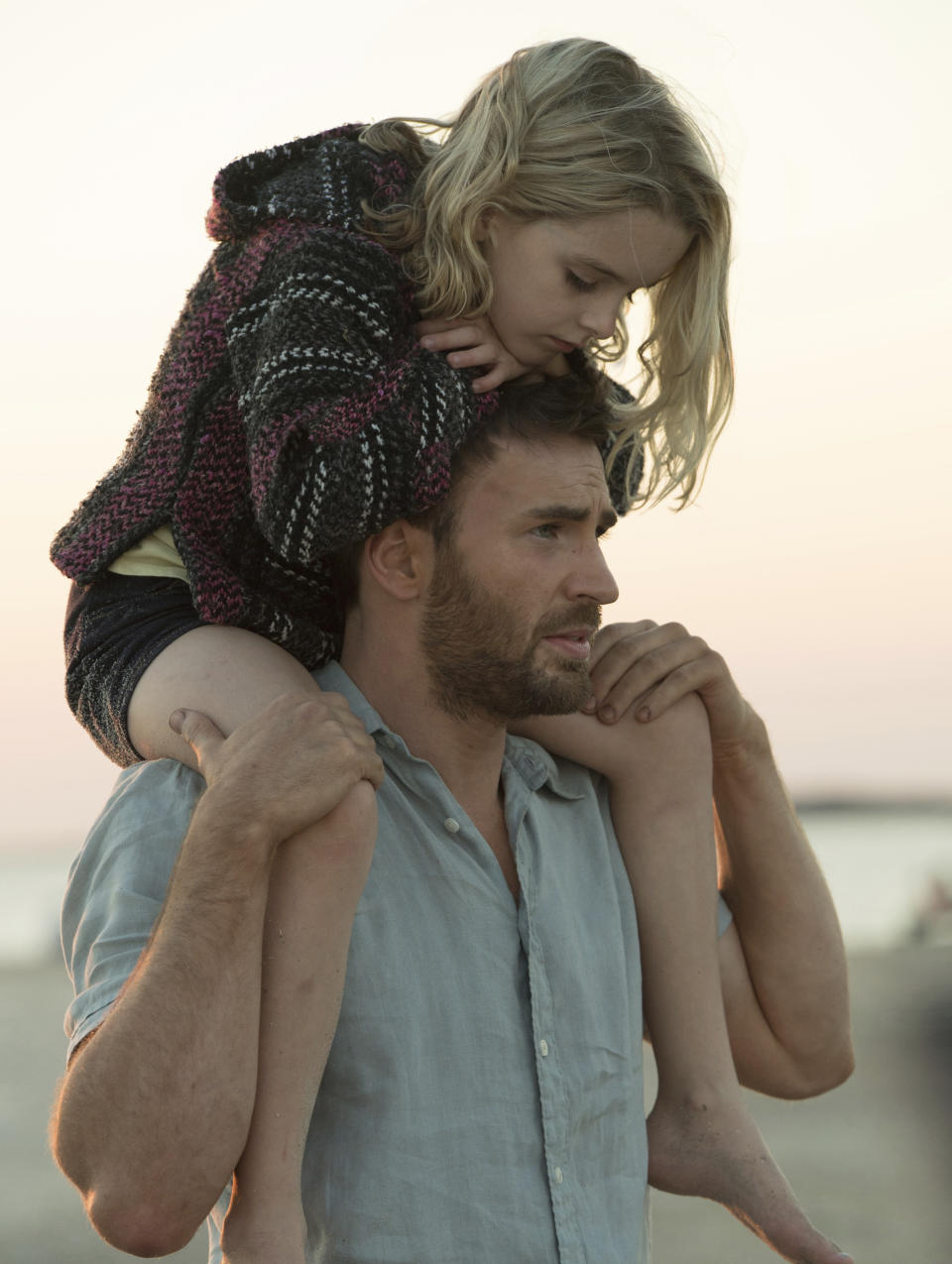 In this image released by Fox Searchlight Pictures, McKenna Grace, left, and Chris Evans appear in a scene from, "Gifted." (Wilson Webb/Fox Searchlight Pictures via AP)