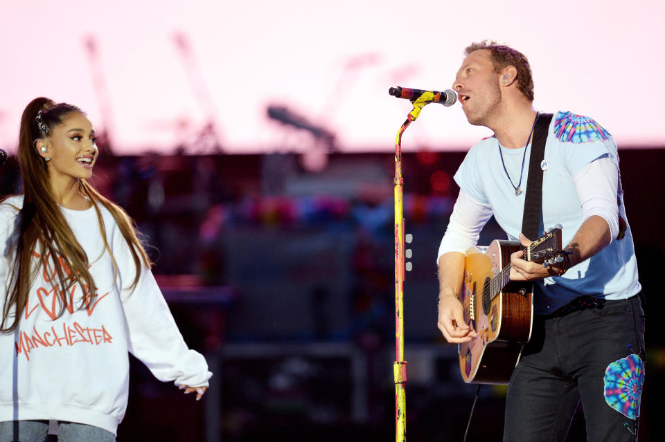 Ariana Grande on stage with Coldplay’s Chris Martin at the One Love Manchester concert. (PA)