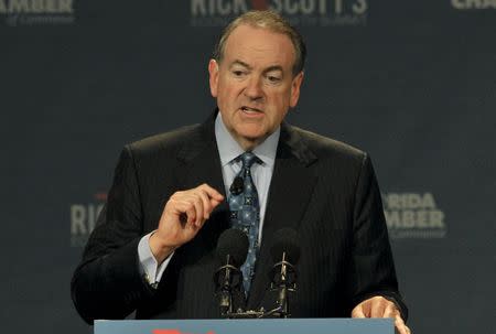 Republican presidential hopeful Mike Huckabee addresses attendees during an economic summit hosted by Florida Gov. Rick Scott in Orlando, Florida, June 2, 2015. REUTERS/Steve Nesius