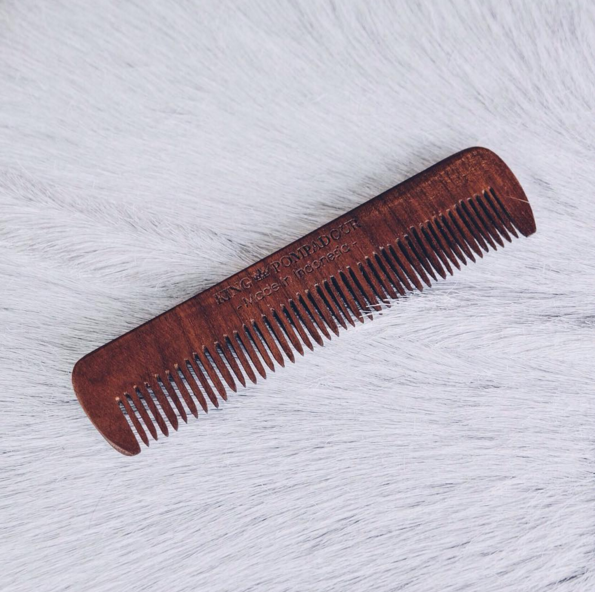 Comb it: While hair is still wet, comb through it with a wide tooth comb instead of a brush. Make sure that it isn’t plastic – wood or metal are ideal. Apparently the comb will help break up any charge that may already be in the hair. If your hair is already dry, sprinkle with water and then comb. (Instagram/kingpompadour)