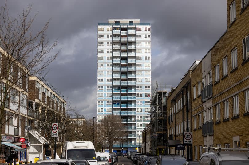 A tower block along a residential street in London