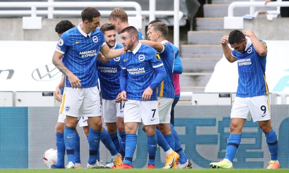 Aaron Connolly is congratulated by teammates after scoring Brighton’s third goal