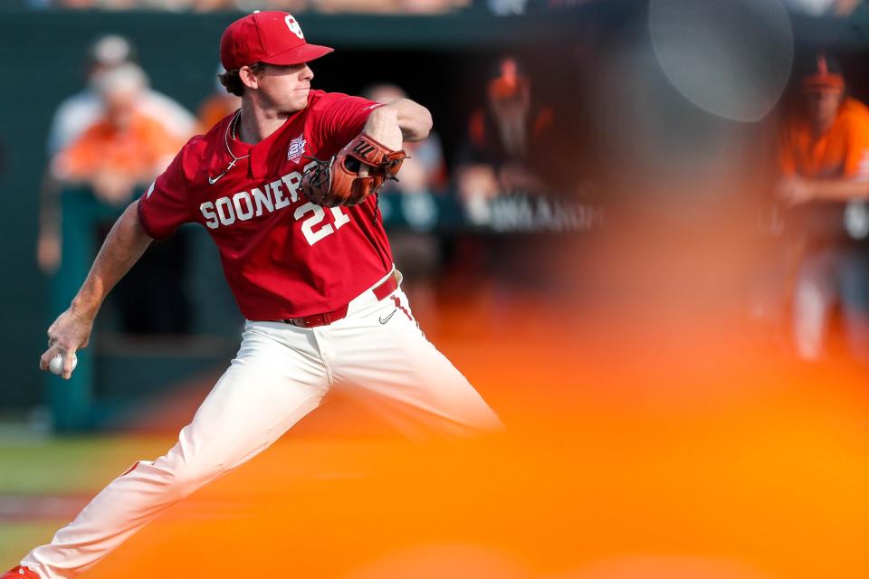 Oklahoma pitcher Carson Pierce (21) pitches during the Bedlam baseball game between the Oklahoma Sooners and the Oklahoma State Cowboys at L. Dale Mitchell Park in Norman, Okla., on Saturday, May 20, 2023.