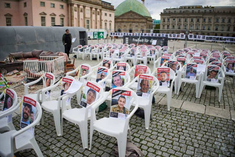 The "Square of the Hamas Hostages" is set up on Bebelplatz. Numerous demonstrations are taking place to mark the first anniversary of the Hamas attack on Israel. Joerg Carstensen/dpa